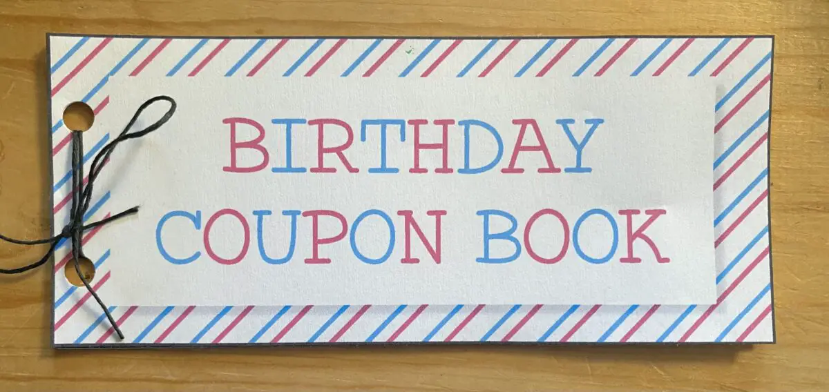 Birthday coupon book cut out and put together with string