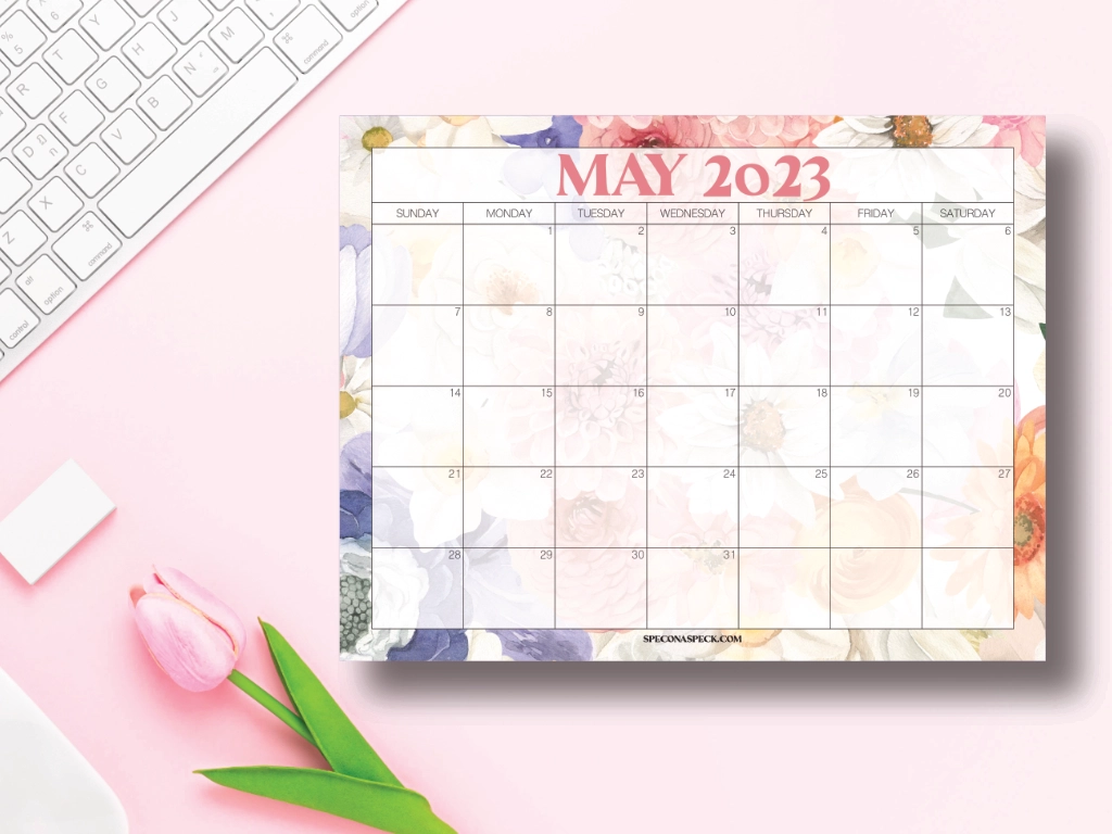 floral calendar on a desktop with the words may 2023 at the top