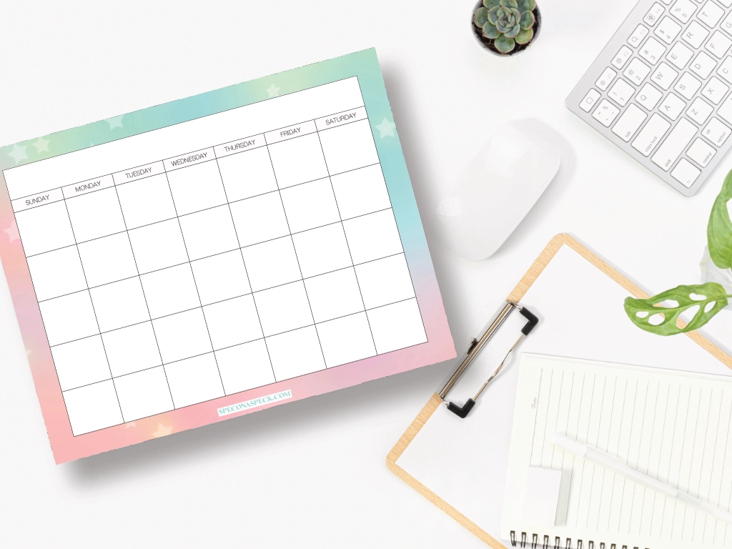 Blank calendar template on desktop next to a clipboard