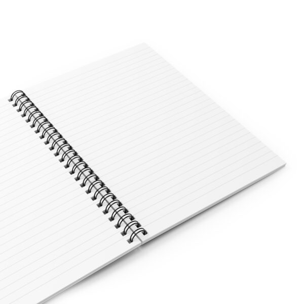 open notebook showing blank lined paper on two pages